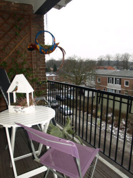 Balkon op het westen, zicht richting Goffertpark